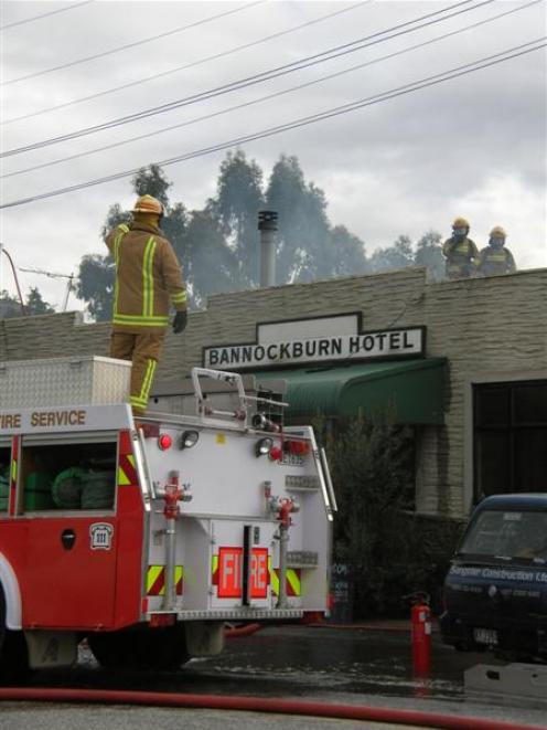 Cromwell, Clyde, and Alexandra firefighters work to extinguish flames and dampen down hot spots...