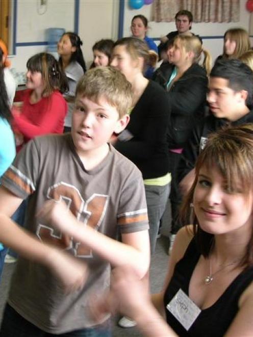 Cromwell College pupils (bottom left) Dillon Adam (13), and Steph Crum (15), perform the Bula...