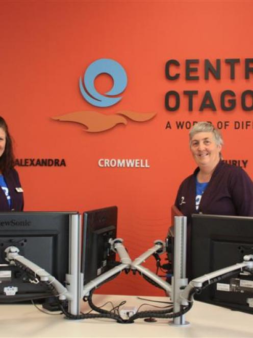 Cromwell i-Site consultant Jacinta Neilson (left) and team leader Helen Scoles inside the new i...