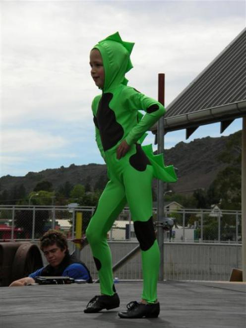Cromwell Primary School pupil Georgia Buchanan (7) performs the "Little Dinosaur Dance" for an...