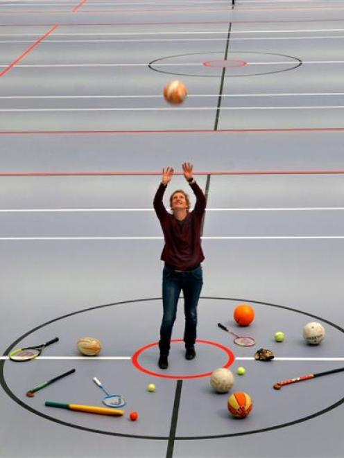 Cross Recreation Centre manager Penny Batchelor tries out a court at the  centre, which will be...