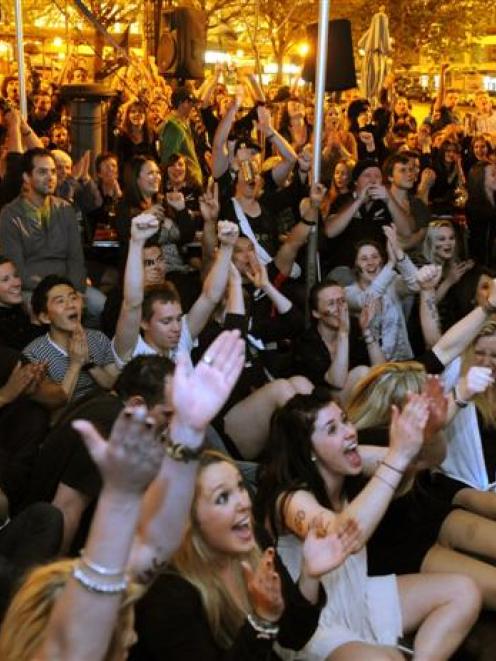 Crowds in Dunedin's Octagon watch the All Black-France final last month.  Rugby World Cup...