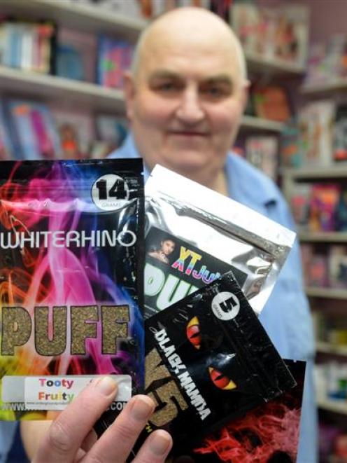 Cupid Shop owner Carl Lapham with non psychoactive legal highs which  he sells. Photo by Stephen...