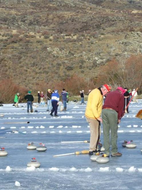 Curlers play the roaring game at Idaburn Dam, competing for the Wilson Cup this week....