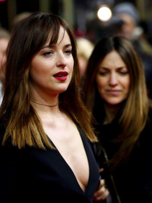 Dakota Johnson arrives for the screening of the movie 'Fifty Shades of Grey' at the 65th...