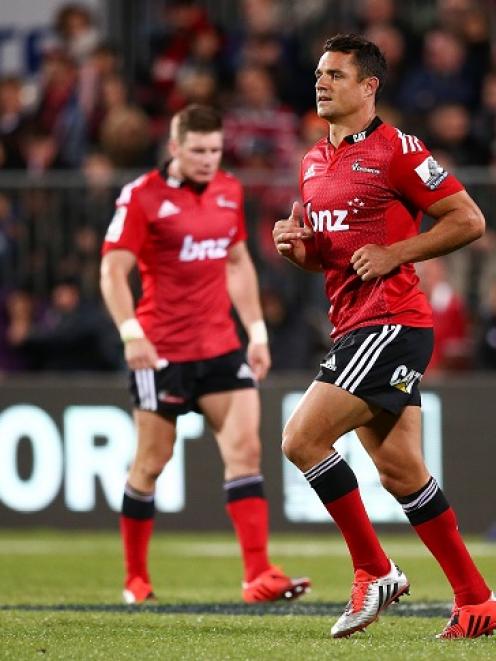 Dan Carter leaves the field during the match between the Crusaders and the Rebels. Photo by Getty...