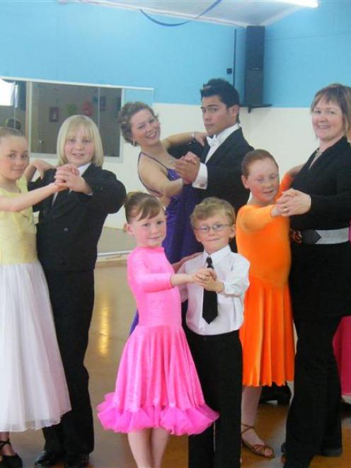 Dancers (back from left) Emily Burney (10) and Jonathon Cox (13), Rosemary Alderton (14) and Joe...