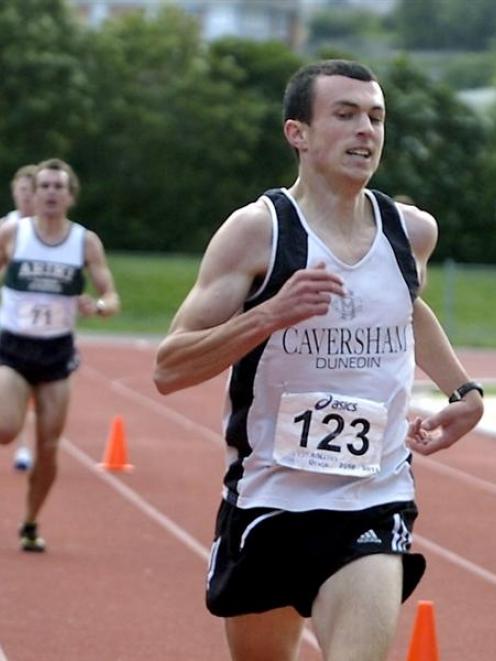 Daniel Balchin (Caversham) wins the Otago 5000m championship from Dougal Thorburn (Ariki) at the...