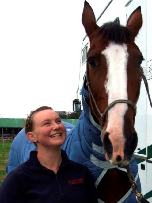 Danielle Simpson and her horse Bartolo prepare for several show-jumping classes at the North...