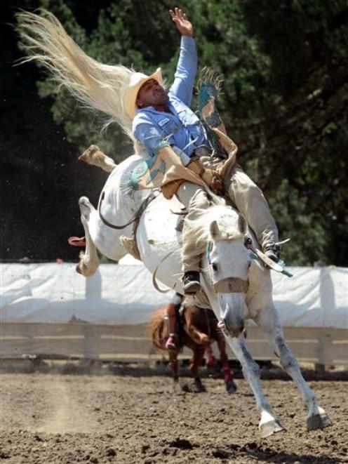 Daryl Church rides  the open bareback event at  the Waikouaiti Rodeo yesterday. Photo by Peter...