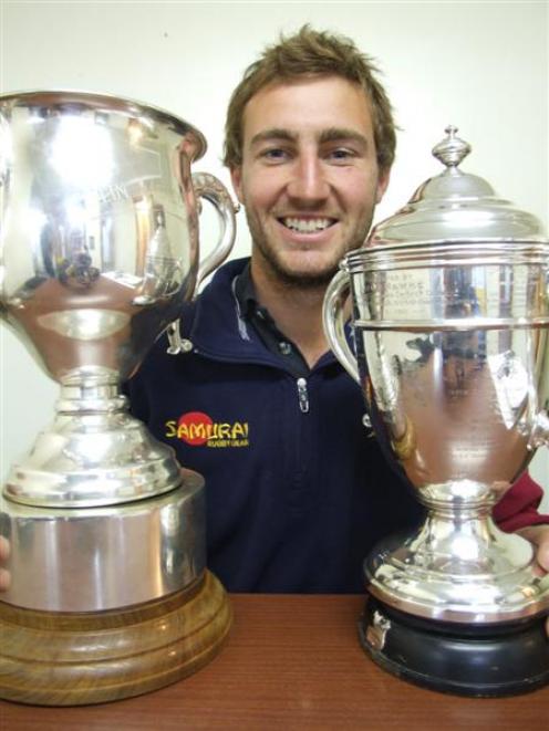 Dave Simpson with the Meads Cup (left) and the Hawke Cup. Photo by Sally Rae.