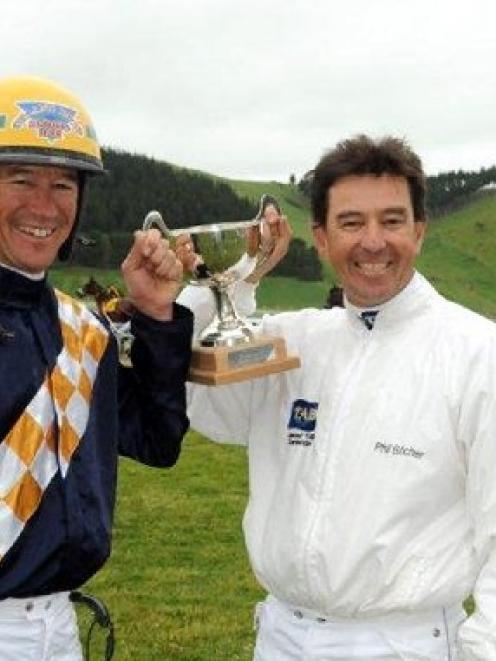David (left) and Philip Butcher, of Cambridge, after winning the drivers' series at Oamaru...