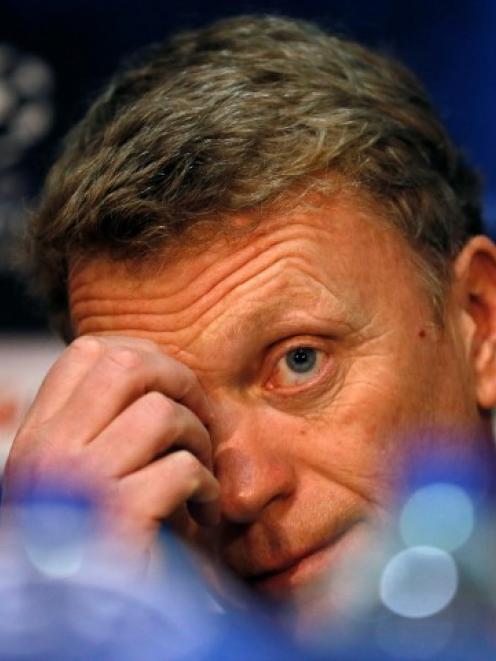 David Moyes faces questions at a news conference at Old Trafford in Manchester. REUTERS/Stefan...