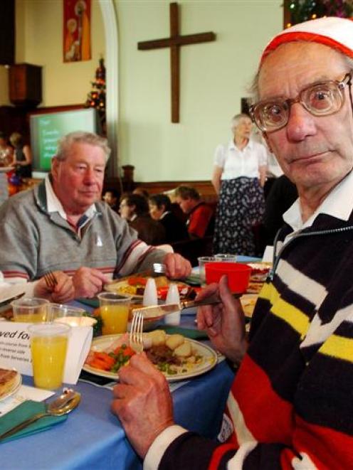 David Strange (front) is joined by Val Tylor and Gordon Clark for Christmas dinner at the St...