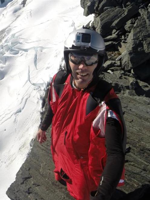 David Walden, of Lake Hawea, prepares to jump from the north shoulder of Mt Avalanche in Mt...