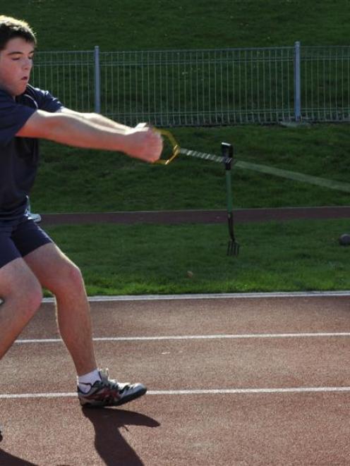Dean Rusbatch practises his hammer throw at the Caledonian Ground. Photo by Gerard O'Brien.