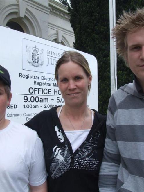 Debbie Devon and sons Jesse (13) and Andrew outside the Oamaru courthouse after yesterday's drink...