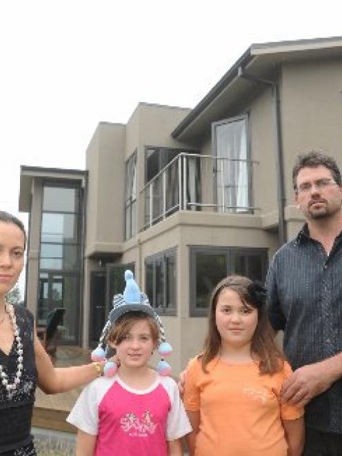Deborah Wai Kapohe, her husband Michael Beazley and their two children are 'living in a student...