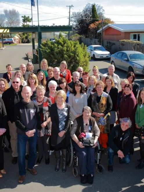 Delegates to the 2013 Small Town Conference  gather outside the Rosebank Lodge, in Balclutha,...