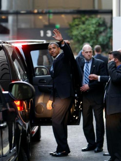 Democratic presidential candidate Barack Obama leaves his hotel en route to a fundraising event...