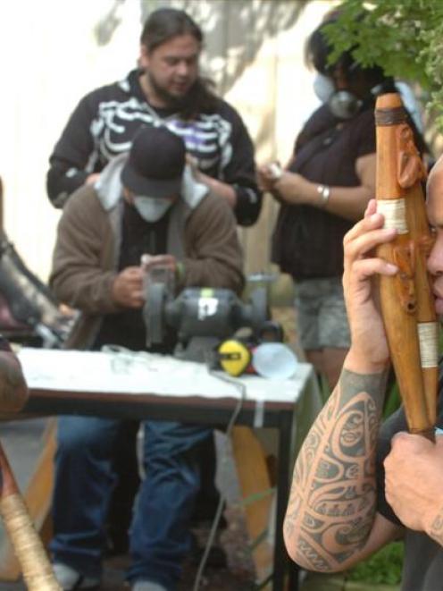 Demonstrating traditional instruments at the Taonga Puoro Workshop in Dunedin on Saturday while...
