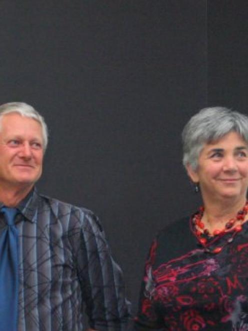 Dennis and Margaret Larsen during a presentation at the New Zealand Farm Forestry Association...