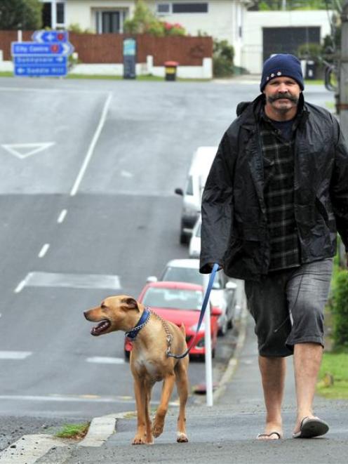 Dennis Trembath and Max enjoy a stroll along Old Brighton Rd, Fairfield, last week. Photo by...