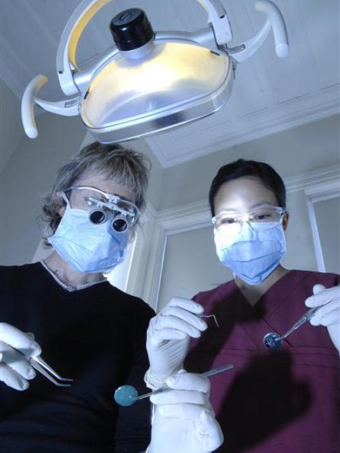 Dentists Saleema Reeves (left) and Sarah Ting prepare for their fundraising event for Pakistan...