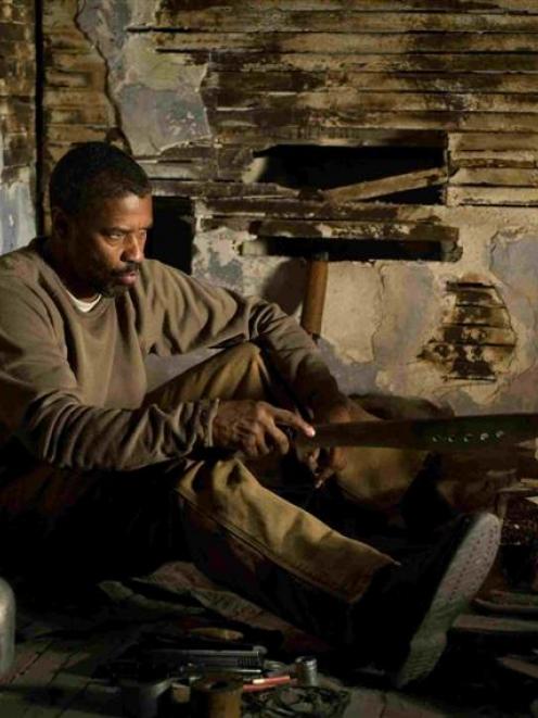 Denzel Washington goes it alone in 'The Book of Eli'. Photo supplied.