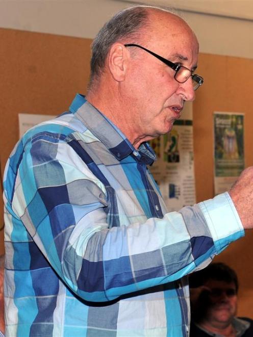 Department of Conservation's Coastal Otago area manager Robin Thomas speaks at his farewell...