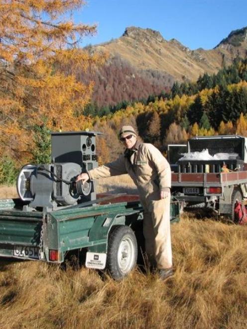 Department of Conservation Wakatipu works officer Richard Struthers with the restored historic...