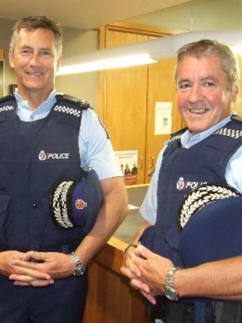 Deputy police commissioner Mike Bush (left) and Southern District police superintendent Bob Burns...