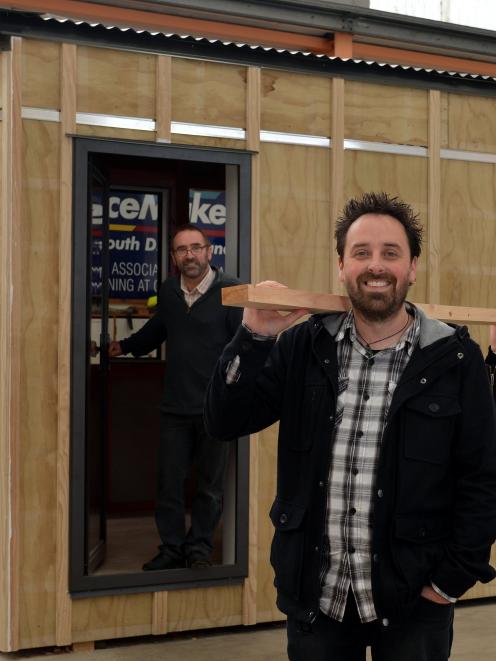 Otago Polytechnic students Dean Griffiths (front) and Charlotte McKirdy, and design lecturer...