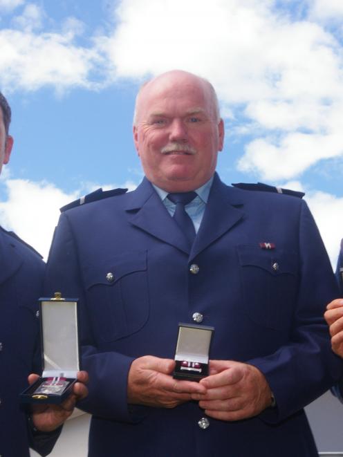 Detective Constable Robin Hutton (left), of Balclutha, Senior Constable Richard Whitmore, of...