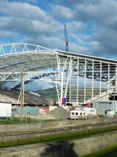 Did the construction of the stadium contribute to Dunedin's pollution levels?