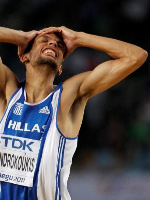 Dimitris Chondrokoukis of Greece reacts during the men's high jump final at the IAAF World...