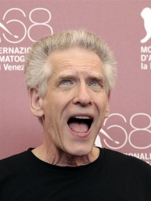 Director David Cronenberg reacts as he poses during a photocall for his film <i>A Dangerous...