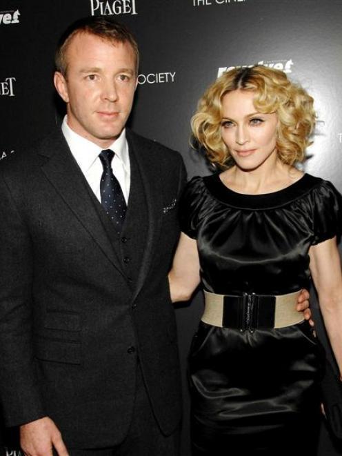 Director Guy Ritchie and his wife Madonna attend a screening in New York in this December 2007...