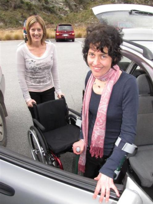 Disability resource consultant Jenny Stone (left) helps CCS Disability Action community...