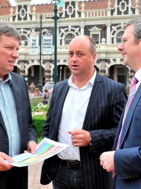 Discussing the implementation of a national tourism strategy are (from left) Tourism Industry...