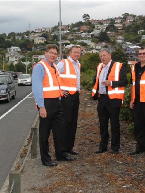 Discussing the improvements to the Caversham highway are (from left) Opus International project...