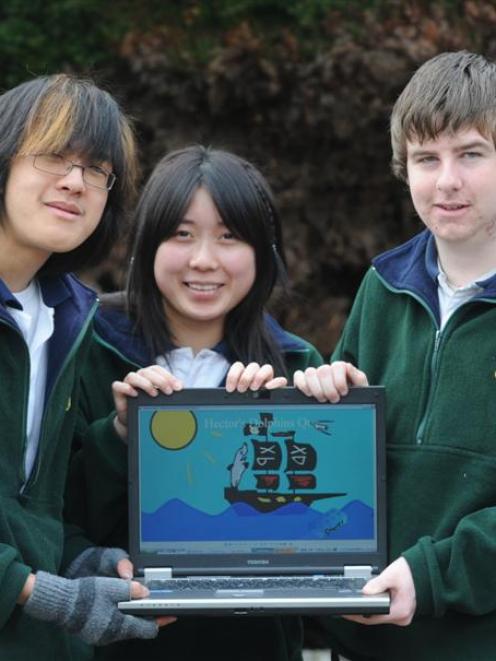Displaying a computer game designed for the New Zealand Dolphin and Whale Trust are Bayfield High...