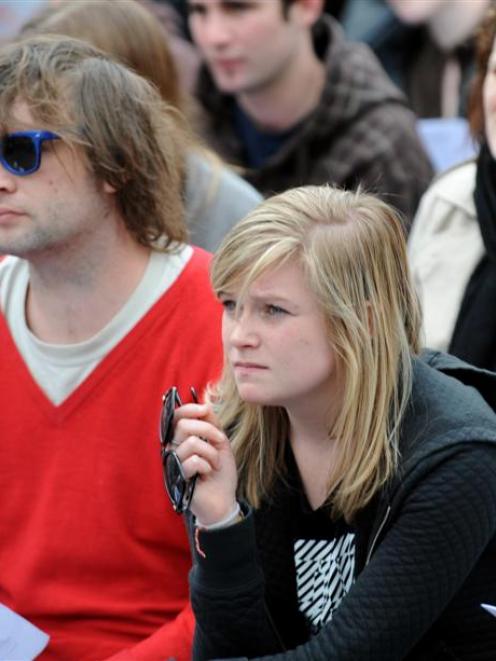 Disqualified OUSA president Jo Moore listens to debate during the student meeting. Photo by...