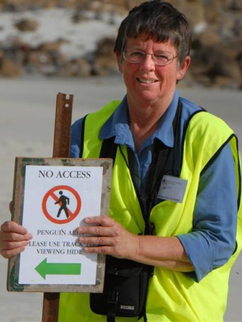 Doc volunteer warden Pat Dean believes there is still room to improve signs. Photo by Gregor...