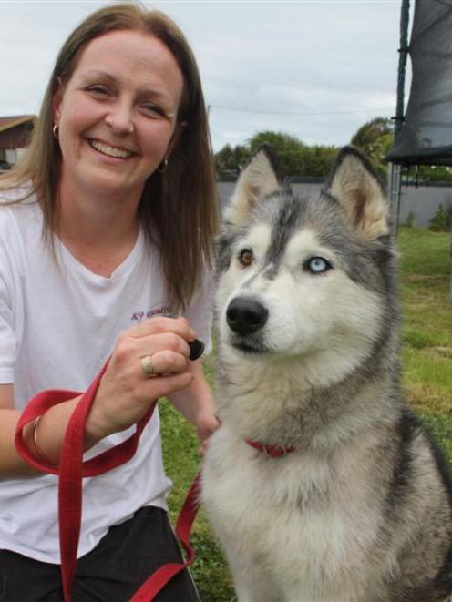 Dog aromatherapist Jo Thomas, of Wallacetown, near Invercargill, prepares to treat  her 6-year...