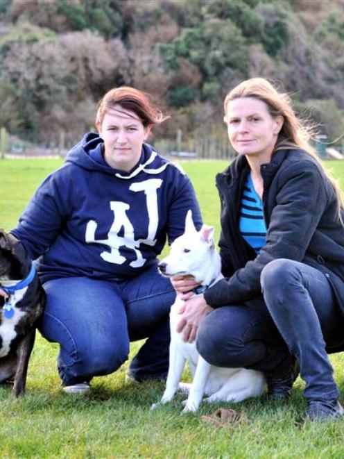Dog Rescue Dunedin handler Anna Broad (left) and co-ordinator Jo Pollard, with rescued dogs Rosie...