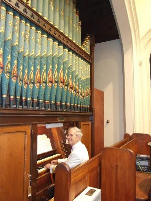 Donald Cullington plays the St Peter's Church organ, which needs major restoration. Photo by...