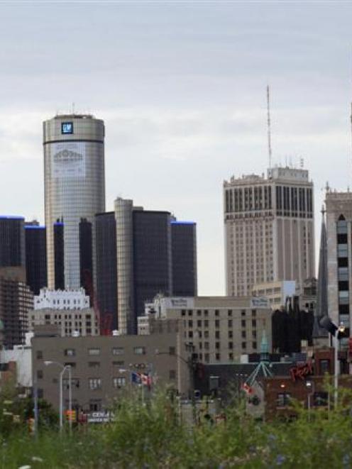 Downtown Detroit, including the General Motors world headquarters (second left), was built by...