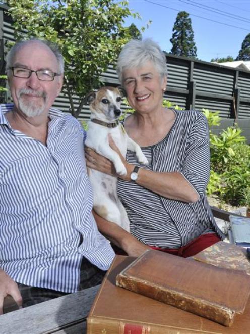 Dr David Galloway and wife Patricia Payne with their dog Lily at home in Dunedin yesterday. Photo...