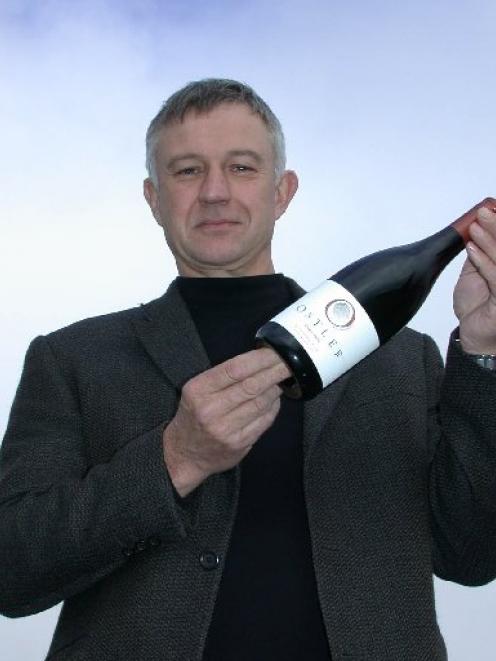 Dr Jim Jerram in 2007 with Ostler Vineyard's first pinot noir, from its vineyard in the lower...